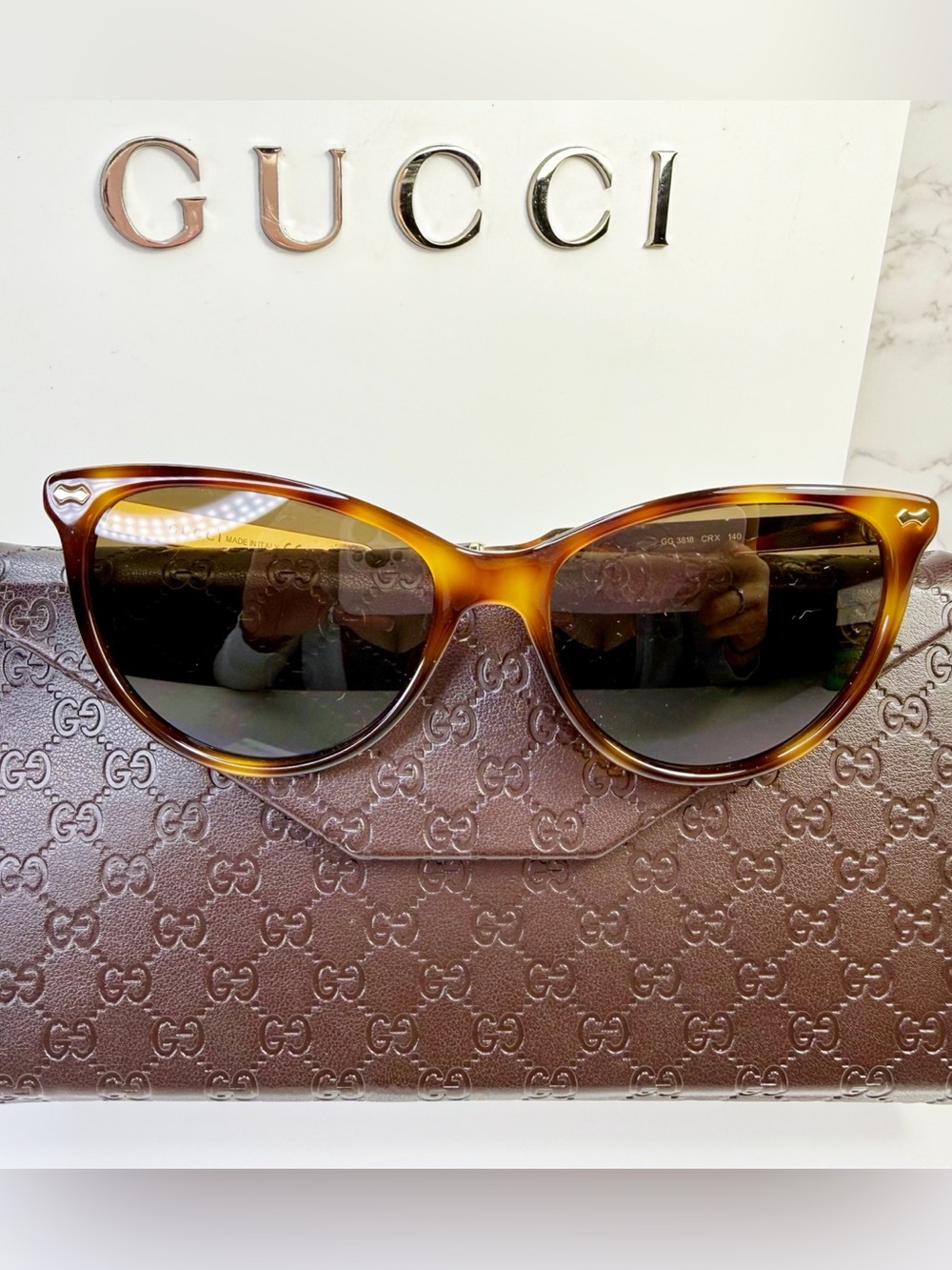 Gucci Tortoiseshell Cat-Eye Sunglasses with Gold Embellished Logo Sides